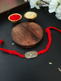 Silver Swastik Ganesha Blessings Rakhi | AMOLA