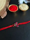 Triple Red Stone Leaf Rakhi Charm | AMOLA