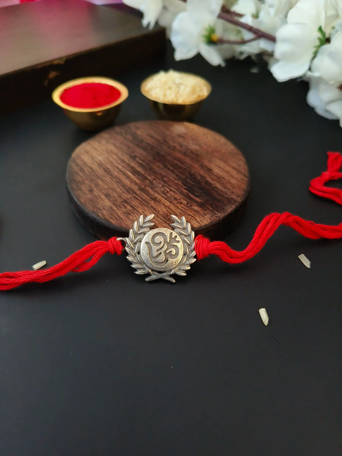 Divine Om Leaf Rakhi in Silver Finish | AMOLA