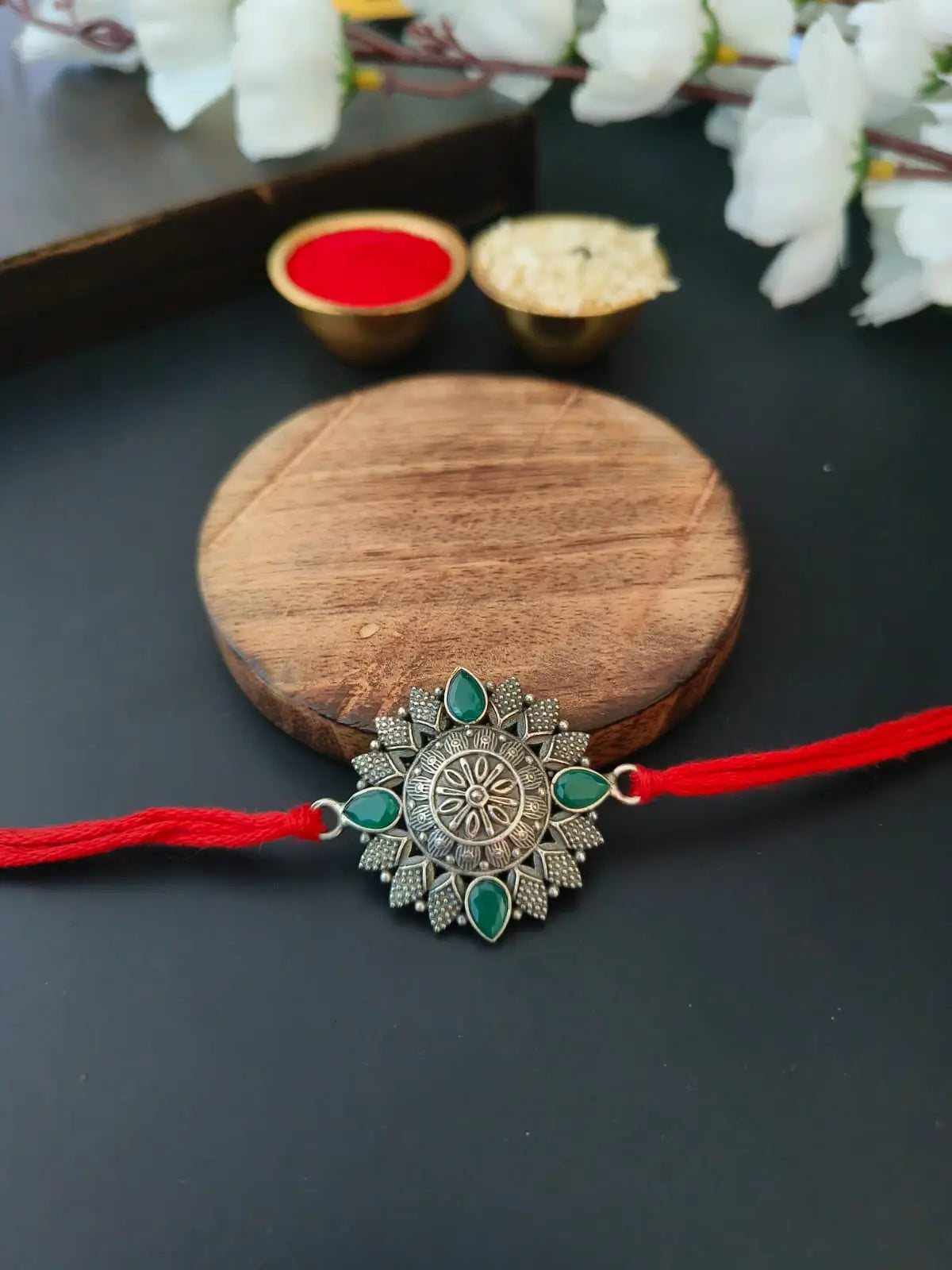 Mandala Floral Rakhi with Green Stones | AMOLA