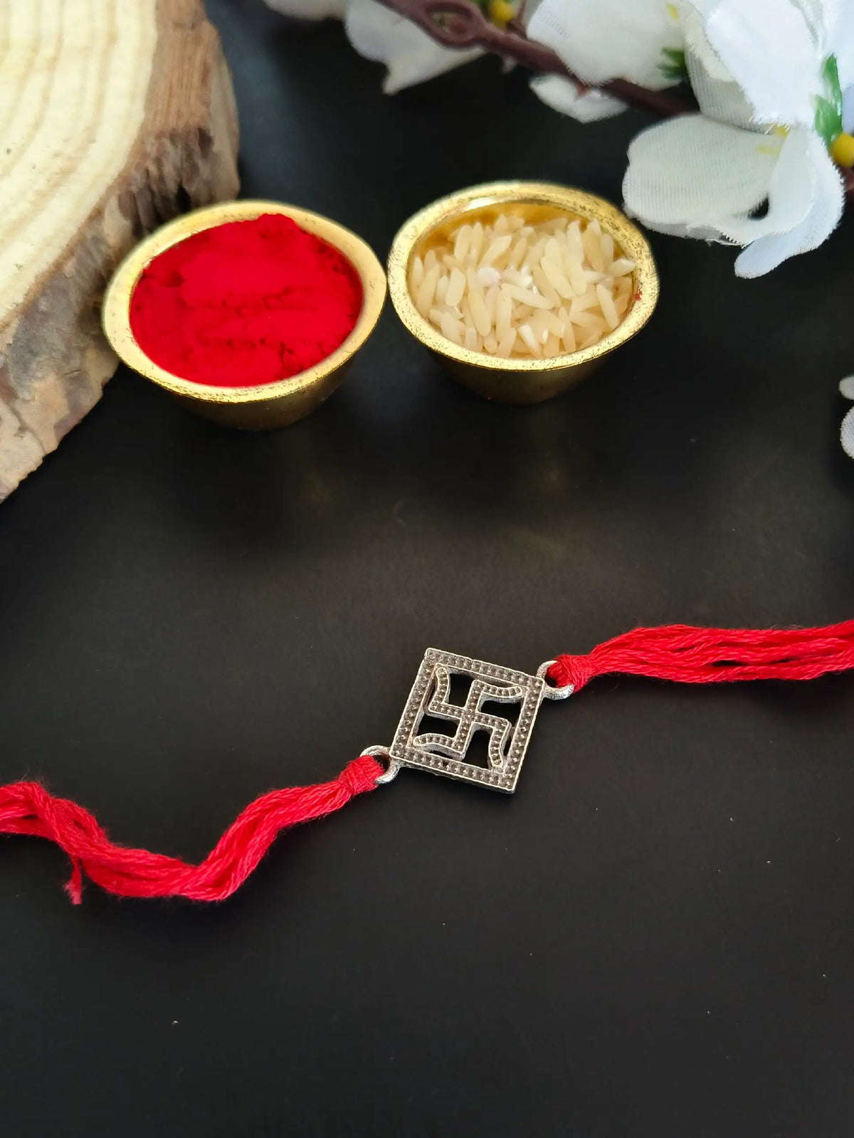 Traditional Swastik Rakhi in Antique Silver | AMOLA