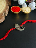 Antique Ganesha Face Rakhi with Red Thread | AMOLA