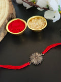 Elegant Lotus Rakhi with Silver Finish | AMOLA