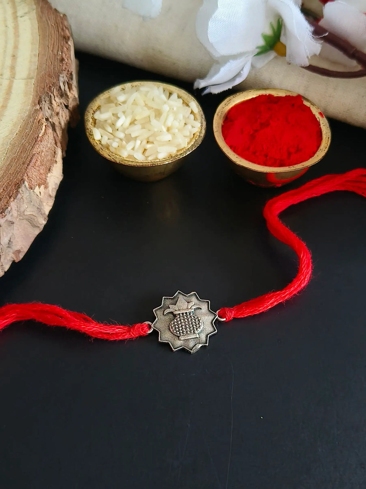 Silver Kalash Rakhi with Intricate Details | AMOLA