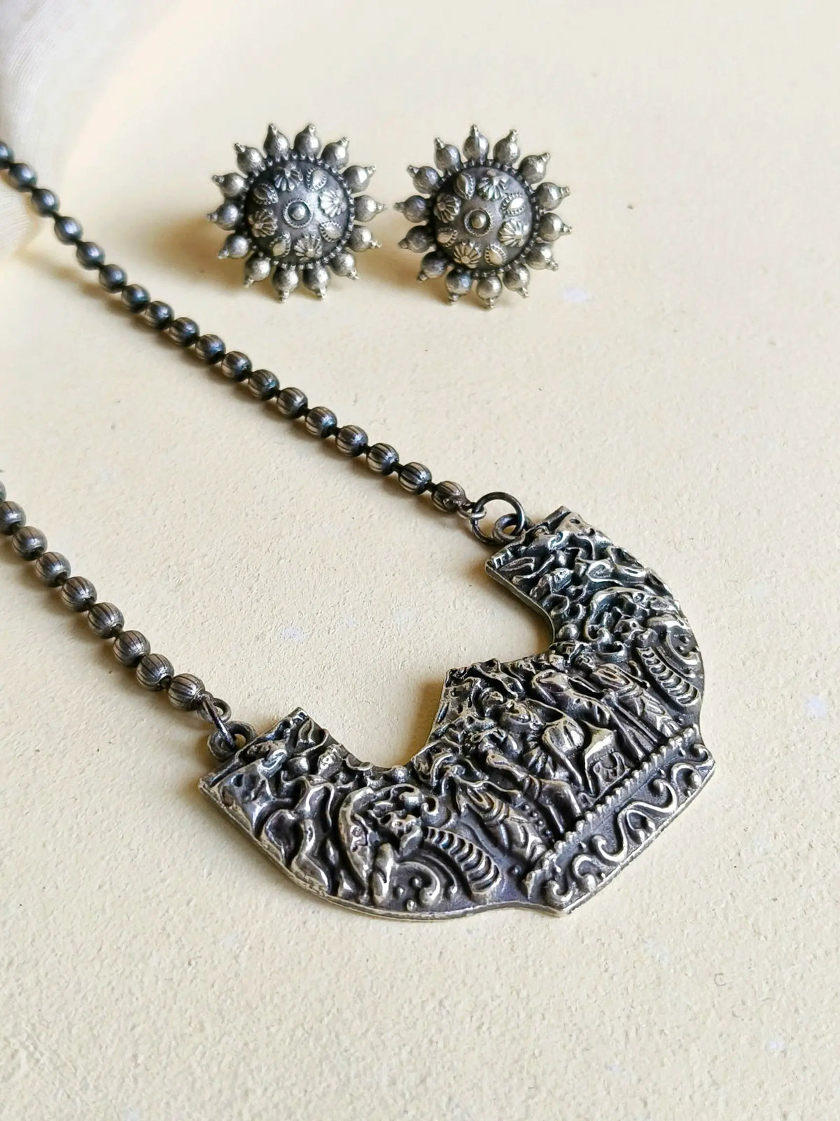 Spiritual Silver Look-Alike Pendant Set for Navratri Festive Style | AMOLA