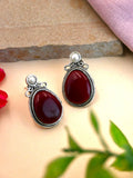 Elegant Oxidised Oval Monalisa Stud Earrings with Silver Polish | AMOLA