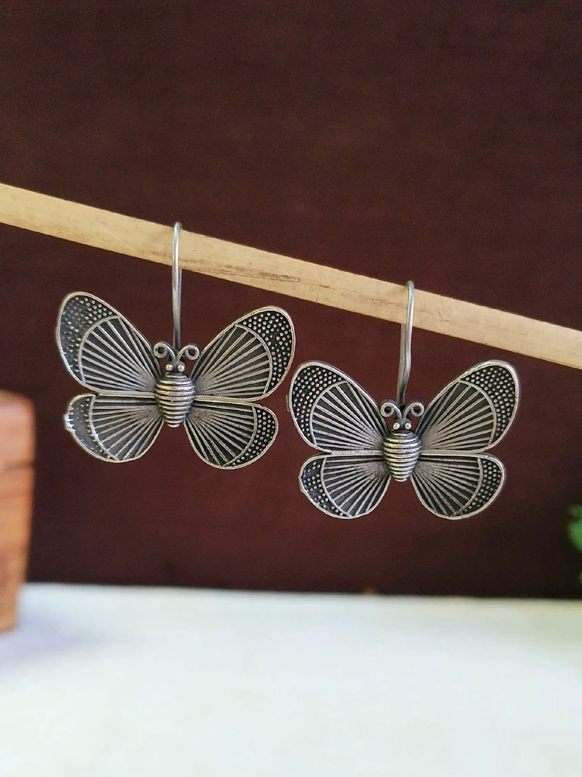 Oxidised Butterfly Brass Hook Earrings for Elegant Charm | AMOLA