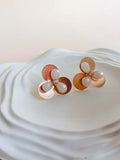 Golden Floral White Stone Stud Earrings | AMOLA